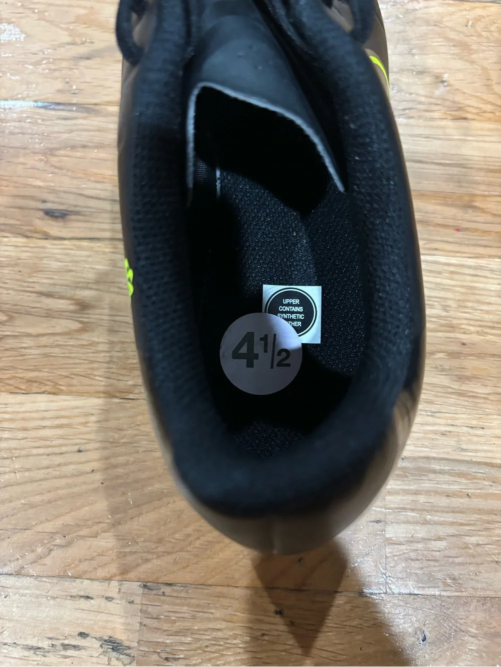 Nike Kids Black Athletic Shoes with Neon Yellow Swoosh